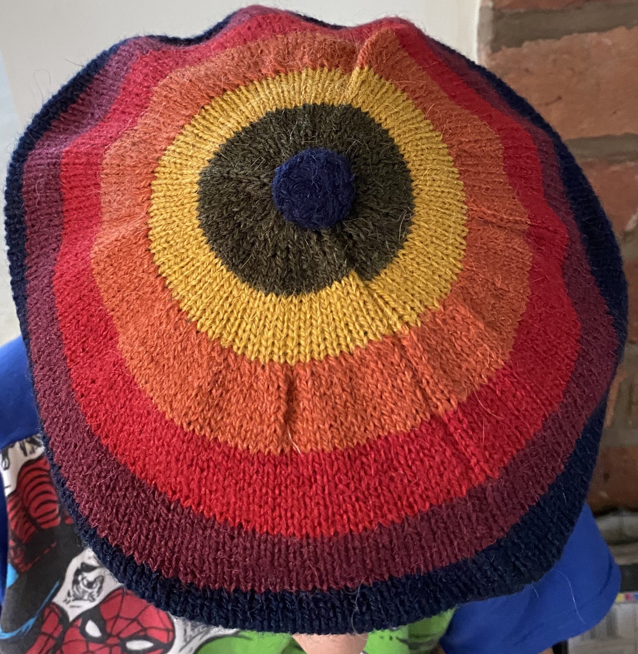 Colourful children's Peruvian beret rainbow design